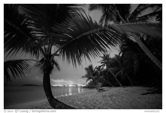 Salomon beach with distant lights at night. Virgin Islands National Park (black and white)