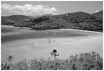 Turquoise waters in Francis Bay with anchored yacht. Virgin Islands National Park, US Virgin Islands. (black and white)