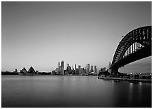 Harbor Bridge, skyline, and Opera House, dawn. Sydney, New South Wales, Australia (black and white)
