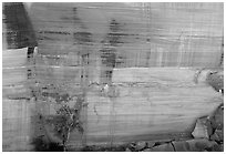 Rock wall striated with desert varnish in Kings Canyon,  Watarrka National Park. Northern Territories, Australia (black and white)