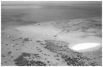 Aerial view of a reef and sand bar  near Cairns. The Great Barrier Reef, Queensland, Australia (black and white)
