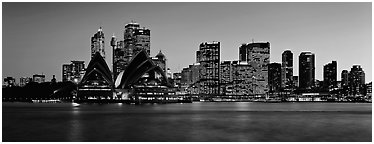 Sydney night cityscape and reflections. Sydney, New South Wales, Australia (Panoramic black and white)