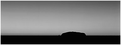 Ayers rock and dawn sky. Uluru-Kata Tjuta National Park, Northern Territories, Australia (Panoramic black and white)