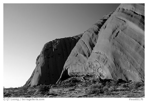 The steep walls of Ayers Rock. Uluru-Kata Tjuta National Park, Northern Territories, Australia (black and white)
