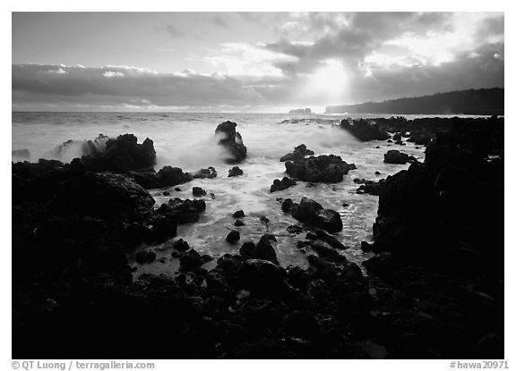 Rocks and surf at sunrise, Keanae Peninsula. Hawaii, USA (black and white)