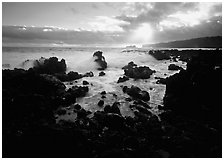 Rocks and surf at sunrise, Keanae Peninsula. Maui, Hawaii, USA ( black and white)
