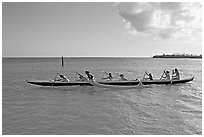 Outrigger canoe, Maunalua Bay, late afternoon. Oahu island, Hawaii, USA (black and white)