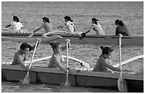 Outriggers canoes during late afternoon practice, Maunalua Bay. Oahu island, Hawaii, USA ( black and white)