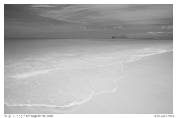 Waimanalo Beach and ocean with turquoise waters and off-shore island. Oahu island, Hawaii, USA (black and white)