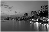 Waterfront and high-rise hotels at dusk. Waikiki, Honolulu, Oahu island, Hawaii, USA ( black and white)