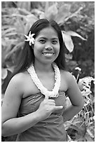 Tahitian woman making the traditional welcome gesture. Polynesian Cultural Center, Oahu island, Hawaii, USA ( black and white)