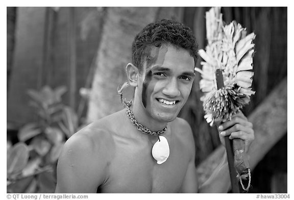 Fiji man with traditional face painting. Polynesian Cultural Center, Oahu island, Hawaii, USA (black and white)