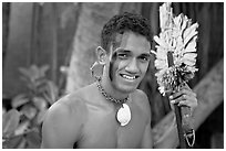 Fiji man with traditional face painting. Polynesian Cultural Center, Oahu island, Hawaii, USA ( black and white)