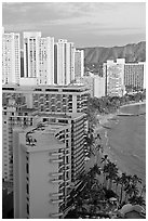 High rise hotels and beach seen from the Sheraton glass elevator, late afternoon. Waikiki, Honolulu, Oahu island, Hawaii, USA ( black and white)