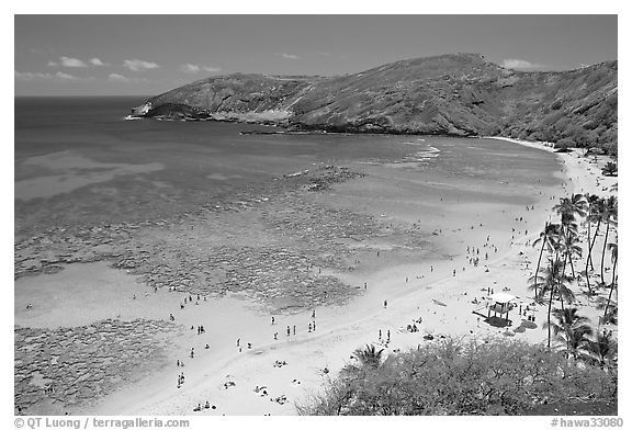 Hanauma Bay and beach with people. Oahu island, Hawaii, USA (black and white)