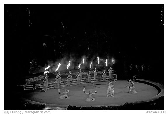 Wedding procession led by torch bearers performed by Tahitian dancers. Polynesian Cultural Center, Oahu island, Hawaii, USA