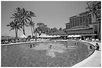 Swimming pool, Halekulani hotel. Waikiki, Honolulu, Oahu island, Hawaii, USA ( black and white)