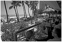 Beachside bar. Waikiki, Honolulu, Oahu island, Hawaii, USA ( black and white)