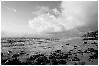 Boulders, beach and clouds, Lydgate Park, sunrise. Kauai island, Hawaii, USA ( black and white)