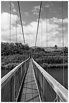 Wooden swinging bridge, Hanapepe. Kauai island, Hawaii, USA ( black and white)