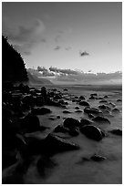 Boulders and misty surf from Kee Beach, dusk. Kauai island, Hawaii, USA ( black and white)