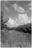 Kayakers, Hanalei River. Kauai island, Hawaii, USA (black and white)