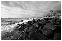Boulders and coastline, Lydgate Park, sunrise. Kauai island, Hawaii, USA ( black and white)