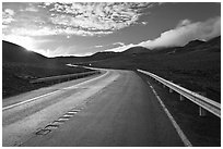 Road and cinder cones. Mauna Kea, Big Island, Hawaii, USA (black and white)