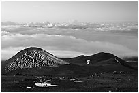 Antenna on volcano top above clouds. Mauna Kea, Big Island, Hawaii, USA (black and white)