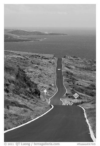 One-lane road overlooking ocean. Maui, Hawaii, USA (black and white)