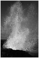 Spouting Horn spurting water 50 feet into the air. Kauai island, Hawaii, USA ( black and white)