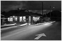 Restaurant and street by night, Lihue. Kauai island, Hawaii, USA ( black and white)