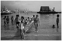 Girls and outrigger canoe, Kailua-Kona. Hawaii, USA ( black and white)