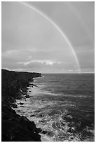 Volcanic coastline and double rainbow. Big Island, Hawaii, USA (black and white)