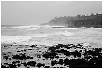 Seascape with strong surf and surfer, Pohoiki. Big Island, Hawaii, USA (black and white)