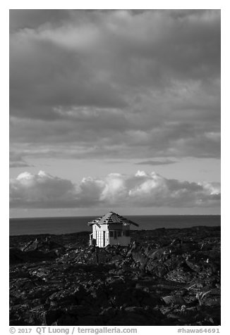 House, lava field, and Ocean, Kalapana. Big Island, Hawaii, USA (black and white)