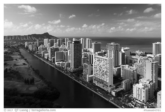 Aerial view of Ala Wai Canal, downtown Waikiki, and Waikiki Bay. Honolulu, Oahu island, Hawaii, USA (black and white)