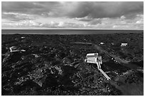 Aerial view of houses on new lava field, Kalapana. Big Island, Hawaii, USA ( black and white)