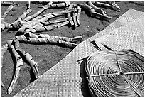 Pandanus leaves and a finished toga (mat) made out of it. American Samoa (black and white)