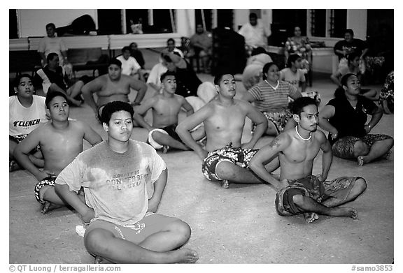 Villagers getting ready for traditional dance, Aua. Tutuila, American Samoa (black and white)