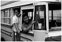 Women in a colorful bus. Pago Pago, Tutuila, American Samoa ( black and white)