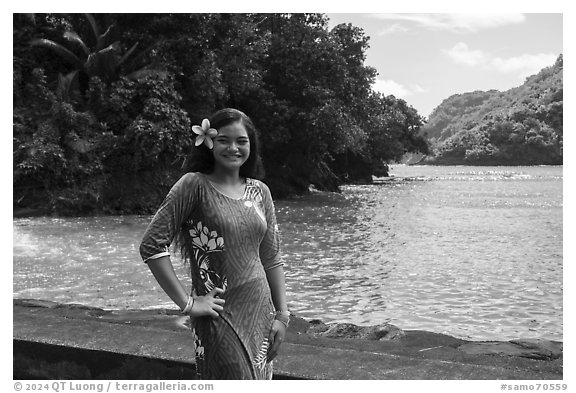 Smiling samoan woman with flower in hair, Fagasa. Tutuila, American Samoa (black and white)