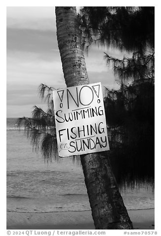 Sign prohibiting leisure activities on Sunday. Tutuila, American Samoa (black and white)