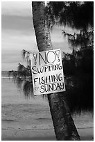 Sign prohibiting leisure activities on Sunday. Tutuila, American Samoa ( black and white)