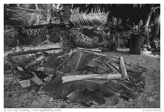 Stone-fired Umu earth oven, Tisa Barefoot Bar. Tutuila, American Samoa (black and white)