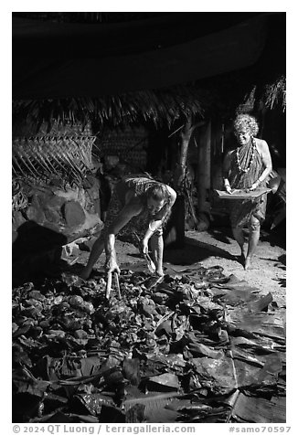 Candy Mann and Tisa Faamuli preparing Samoan Umu Feast. Tutuila, American Samoa (black and white)