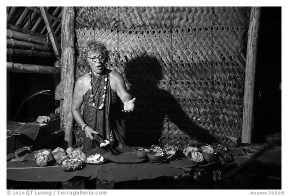 Tisa Faamuli serving Samoan Umu Feast. Tutuila, American Samoa (black and white)