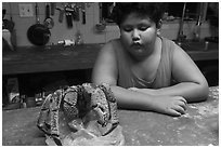 George looking at frozen coconut crab, Ofu Island. American Samoa ( black and white)