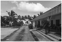 Store and beachfront, Olosega. American Samoa ( black and white)