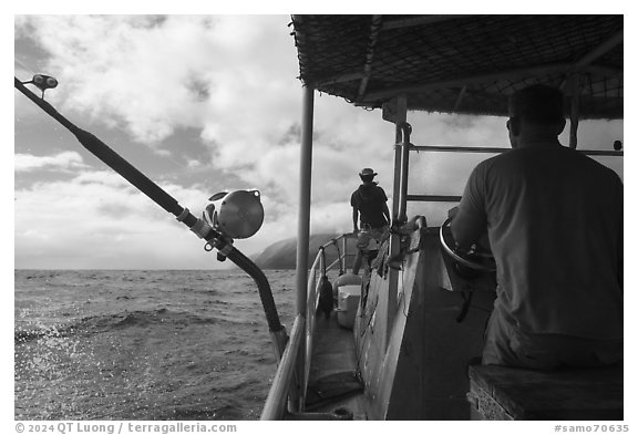 Alia boat approaching Tau Island. American Samoa (black and white)